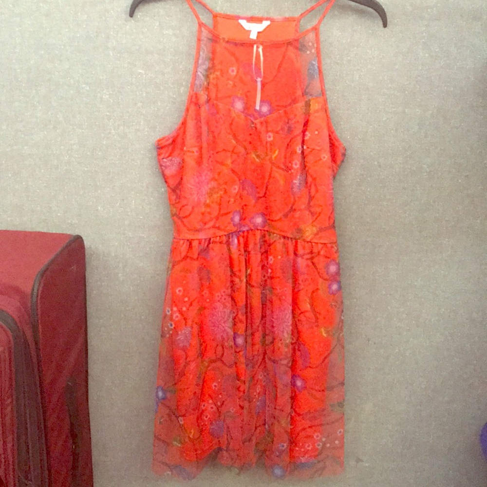 Candie’s red dress